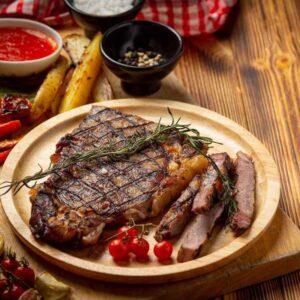 grilled-beef-steak-dark-wooden-surface (1)